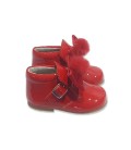5161 Baby boots with pom pom